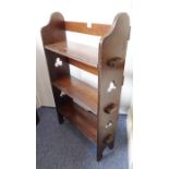 An early 20th century Arts and Crafts-style oak open book stand (55cm wide)