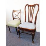 An early 18th century walnut side chair; the pierced splat above a drop-in seat with a deep frieze