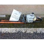 An Echo HC-1500 rotary hedge cutter with instructions etc.The hedge trimmer is in working order