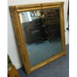 A large 19th century wall-hanging looking glass having gilt frame (frame size 101cm x 124cm)