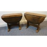 A pair of oval oak drop-leaf occasional tables