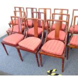 A set of 14 19th century-style (reproduction) rattan-cane seated dining chairs