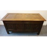 A good late 17th century panelled oak chest of good colour; the scratch-moulded four-panel hinged