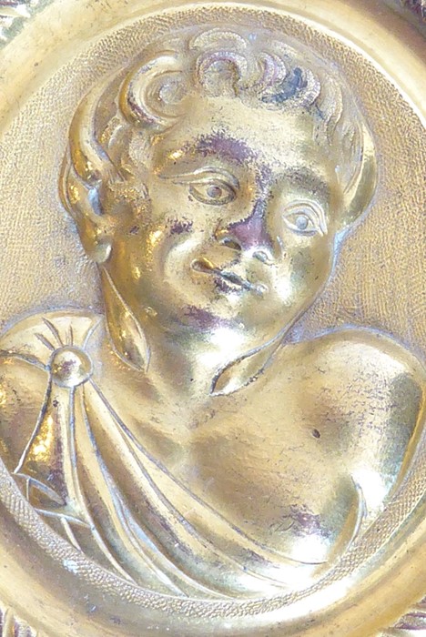 A 19th century circular gilt-metal wall-hanging relief study of a young male figure with curly - Image 3 of 3