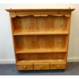 A wall-mounted modern pine rack with three frieze drawers (100cm wide x 115cm high)