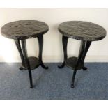 A pair of late 19th century circular ebonised occasional tables carved with flower heads in
