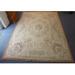 A large flat-weave needlepoint carpet in French Aubusson tapestry style: central oval with a