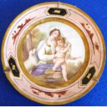 A 19th century French cabinet plate depicting Cupid in the arms of Venus and with a lamb in