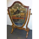 A Hepplewhite-style mahogany-framed toilet mirror