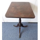 A Regency period rectangular-topped mahogany tilt-top occasional table; reeded-edged top above