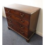A good late 18th century mahogany chest; the moulded top above four full-width graduated doors