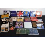 A good quantity of uncirculated coins comprising 25 collections and 23 single-coin packs; mostly UK,