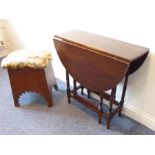 An early 20th century Arts and Crafts oak stool together with an early 20th century oval mahogany
