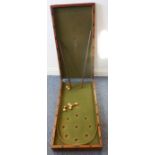 A 19th century mahogany bagatelle board with accessories etc.