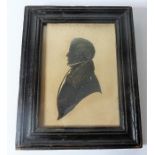 A framed late Georgian silhouette of a gentleman