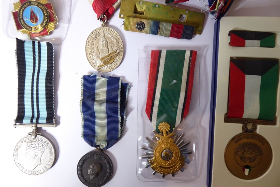 An assortment of six medals together with a large collection of medal ribbons: the Greek - Image 2 of 2