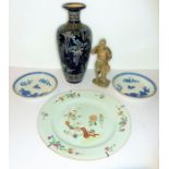 Two 18th century blue-and-white Chinese saucers, together with an 18th century Chinese famille