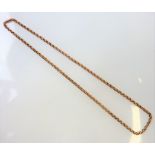 A Victorian 9-carat rose-gold neckchain (approx. weight 4.16g) (The cost of UK postage via Royal