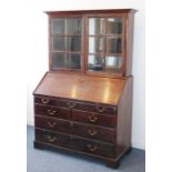 A very well-made 18th century style (later) Anglo-Indian rosewood bureau cabinet; the outset cornice