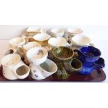 A collection of twelve various ceramic shaving mugs