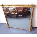 A large gilt-framed overmantle mirror (frame size 112cm x 102cm high)