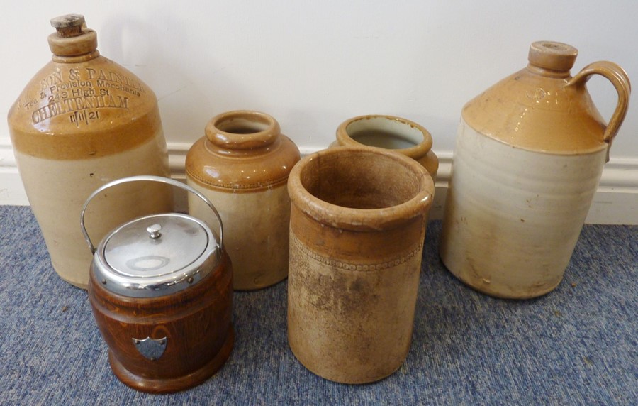 Five early 20th century stoneware jars / flagons together with a wooden biscuit barrel