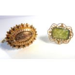 A Victorian 9-carat gold brooch together with a 9-carat gold and jade brooch (8.9g) (The cost of