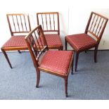 A set of four Sheraton-style mahogany dining chairs having drop-in seats and turned tapering front