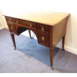 A Georgian-style mahogany boxwood-strung desk; five drawers and raised on square tapering and