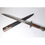 A British Pattern 1888 Mk 1 Type 2 (Lee Metford rifle) bayonet; 11½" blade, the wooden grips drilled