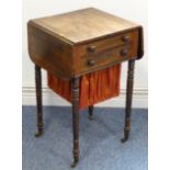 A early 19th century Regency period rosewood and brass inlaid work table; two graduated full-width