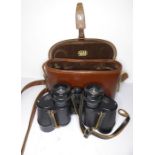 A leather-cased pair of Ross, London field glasses, 8 x 30 Steptron, the glasses marked Negretti &
