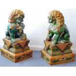 A large and very imposing pair of floor-standing ceramic karashishi (Buddhistic temple lions),