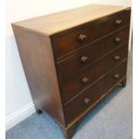 A George III period mahogany chest; four full-width graduated drawers and raised on shaped bracket