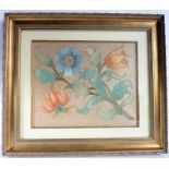 A gilt-framed and glazed 17th century style (later) needlework study of a tulip and other flowers (