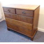 A late 18th century George III period oak chest; two half-width over three full-width graduated