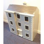 A fine and impressive 1970s scratch-built dolls' house in the Georgian style; double fronted and