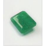 An oblong emerald of approximately 8 carats (unmounted) (The cost of UK postage via Royal Mail