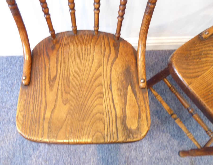 A pair of late 19th/early 20th century kitchen-style chairs; each with concave top rail above turned - Image 4 of 4