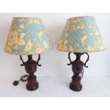 A pair of neo-Classical style wooden lamps and shades