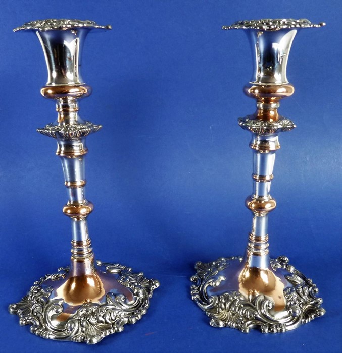 A pair of late 19th century Sheffield plate candlesticks