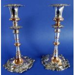 A pair of late 19th century Sheffield plate candlesticks