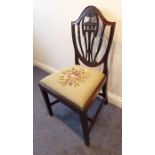 A single Hepplewhite-style mahogany dining chair