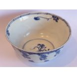 A Chinese Kangxi period porcelain bowl; delicately hand-decorated with floral sprigs below an