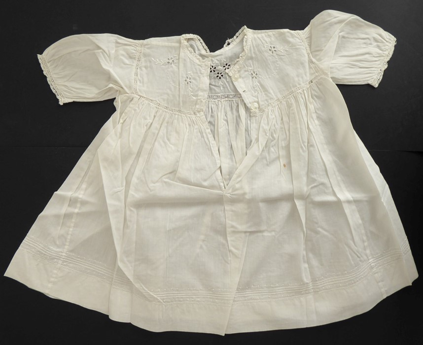 A circa 1930s child's dress; cotton lawn with white work detailing on yoke, C.B. opening - Image 2 of 3