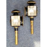 A pair of early 20th century brass-mounted coaching lamps in good condition; each signed 'Patent' (