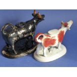 A 19th century Jackfield cow creamer together with one other similar slightly smaller