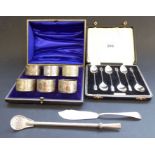 A set of six hallmarked silver coffee spoons together with a set of six late 19th/early 20th century