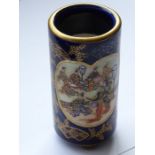 A good and small cylindrical Japanese porcelain spill vase, circa 1900; decorated with two