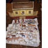 A late 19th/early 20th century wooden Noah's Ark; in play-worn condition and with a variety of the